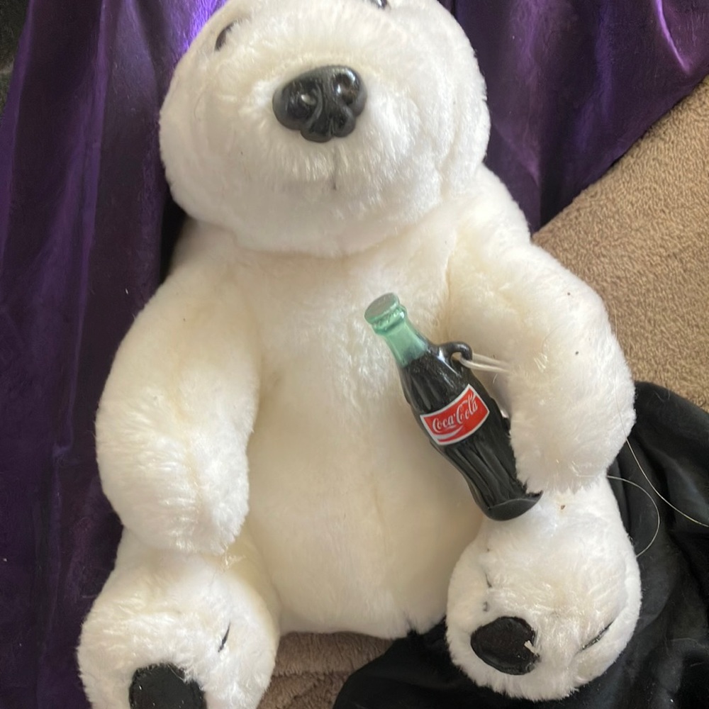 FINAL MARKDOWN Bear holding Coca Cola bottle